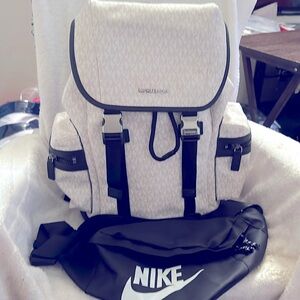 MK MENS SIGNATURE BACKPACK /W NEW FREE NIKE BUM BAG. 43” STRAP